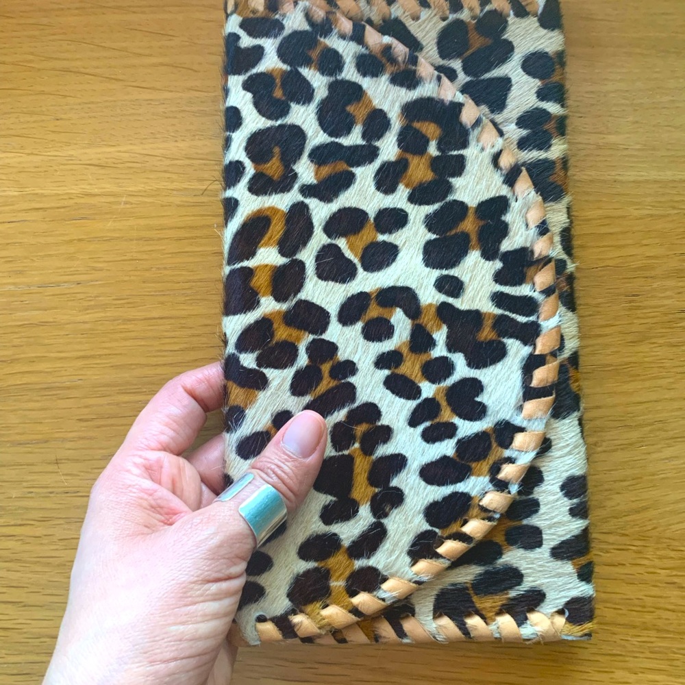 Classic leopard print hair on hide & leather magnetic clutch.